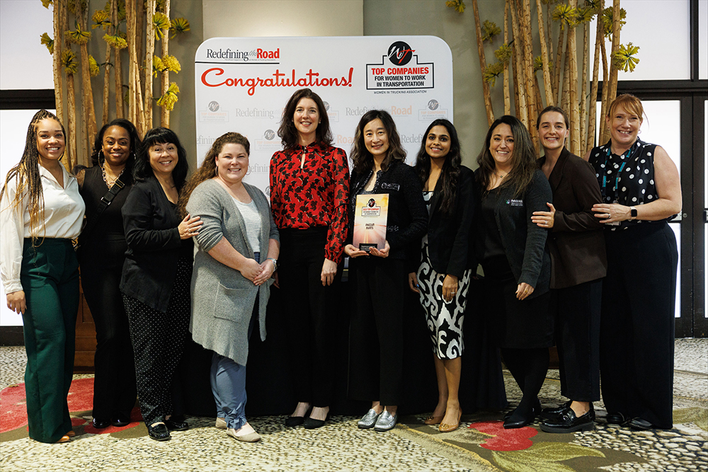 PACCAR Parts employees reveiving 2023 Top Companies for Women to Work for in Transportation award