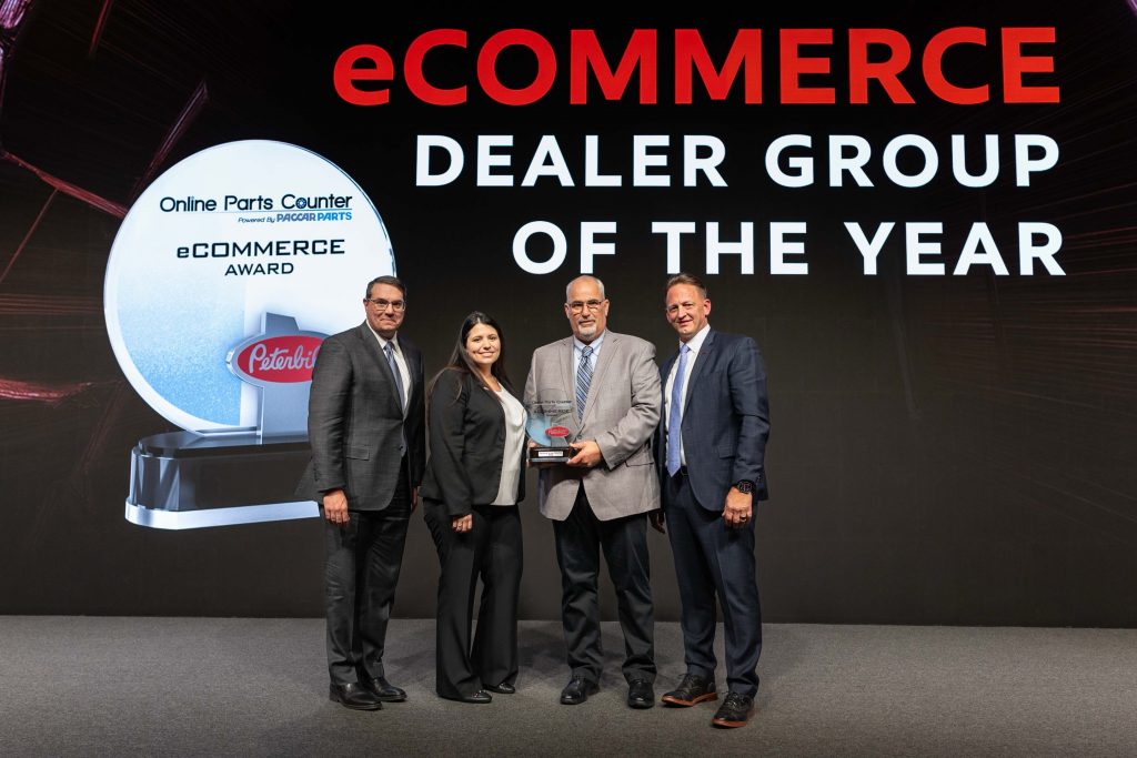 Dimmick Group Peterbilt receiving the 2024 eCommerce Dealer of the Year award