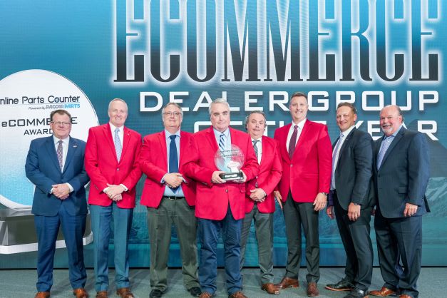 The Larson Group receiving the new eCommerce Dealer of the Year award