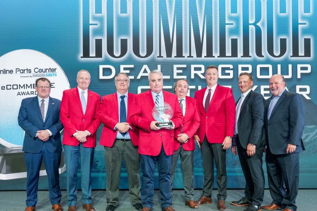 The Larson Group receiving the new eCommerce Dealer of the Year award
