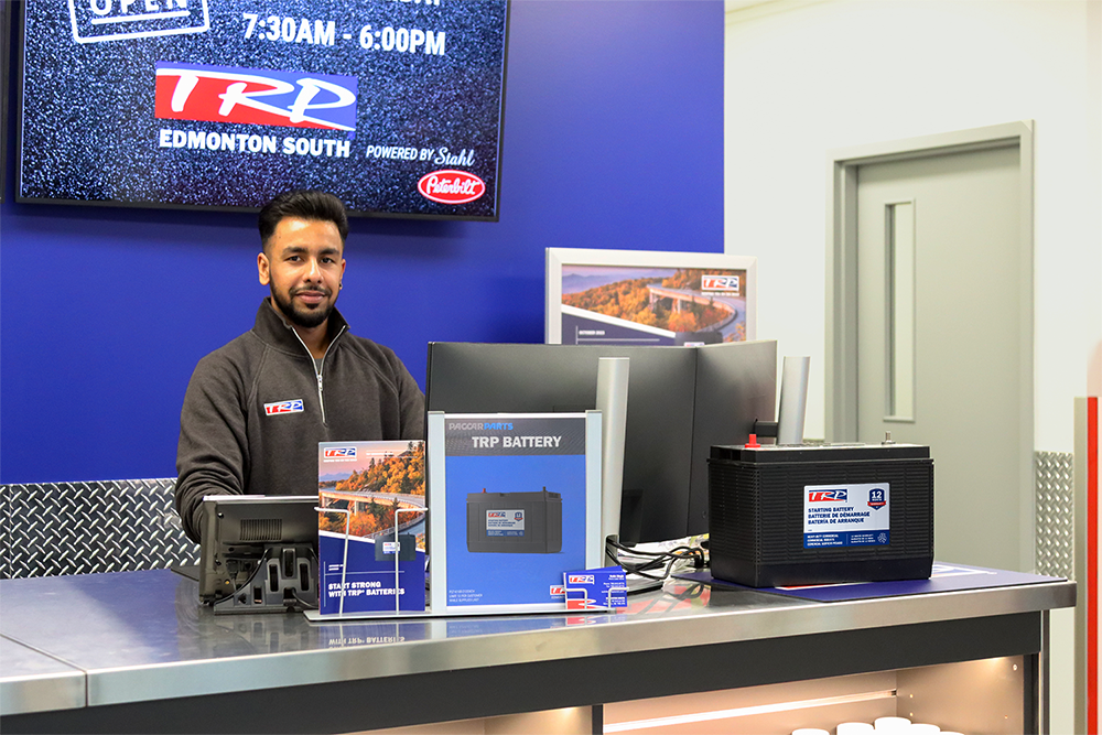 TRP Edmonton South employee behind parts counter